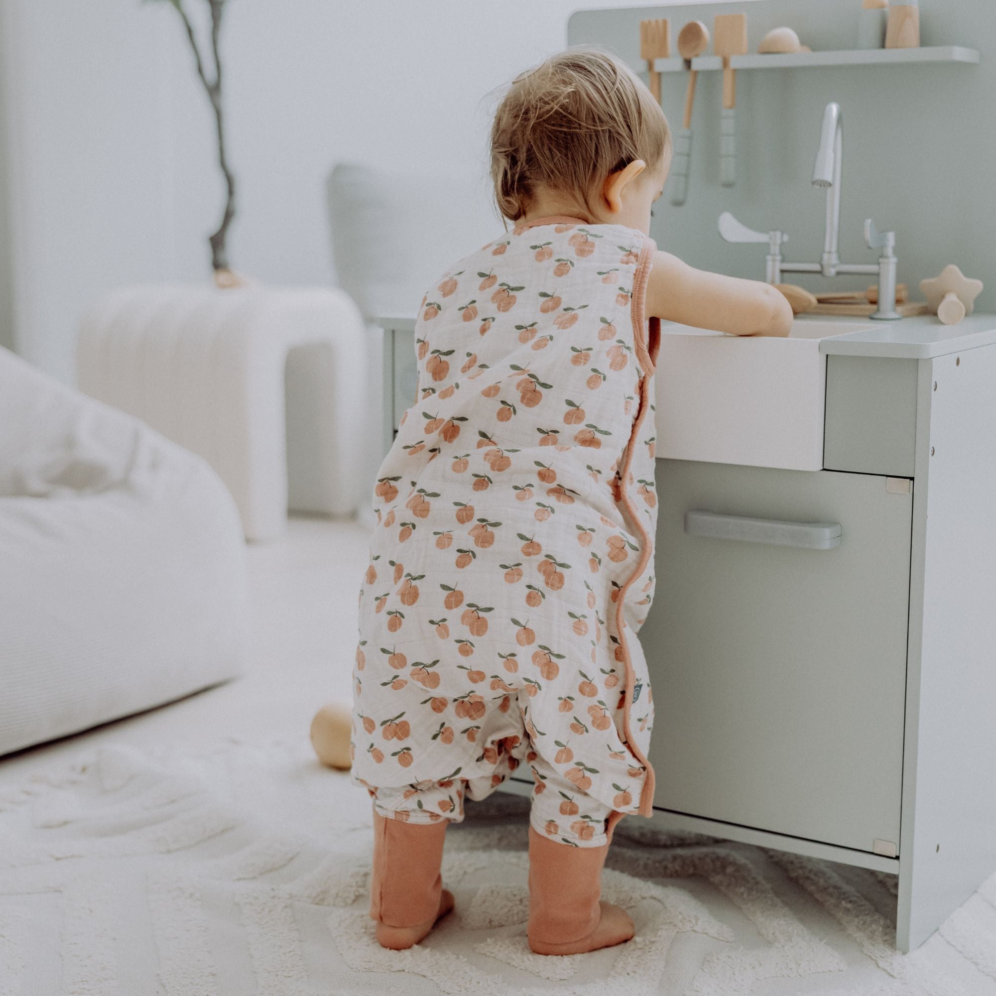 Mousseline slaapzak met voetjes 0.5 TOG | Abrikoos