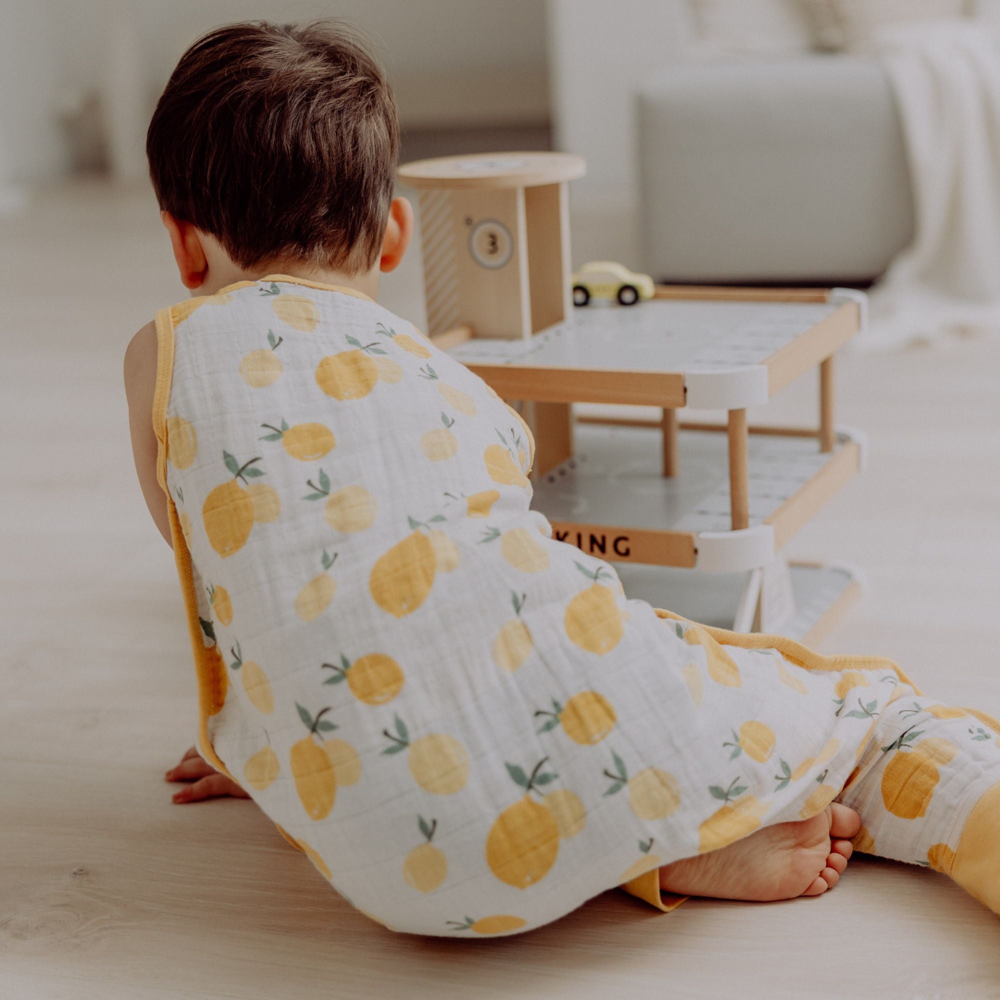 Mousseline slaapzak met voetjes 0.5 TOG | Citroen